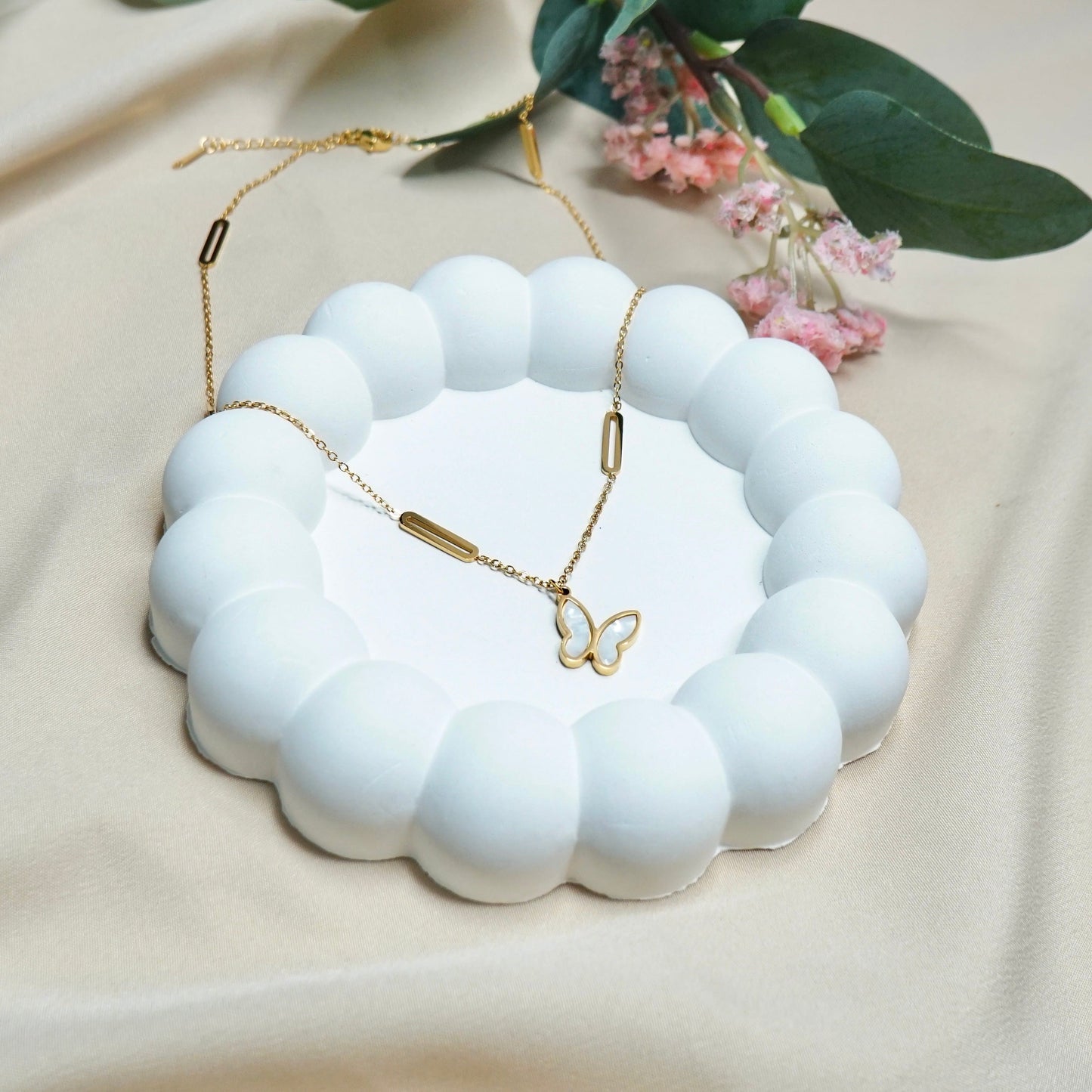 Butterfly with Capsule Chain
