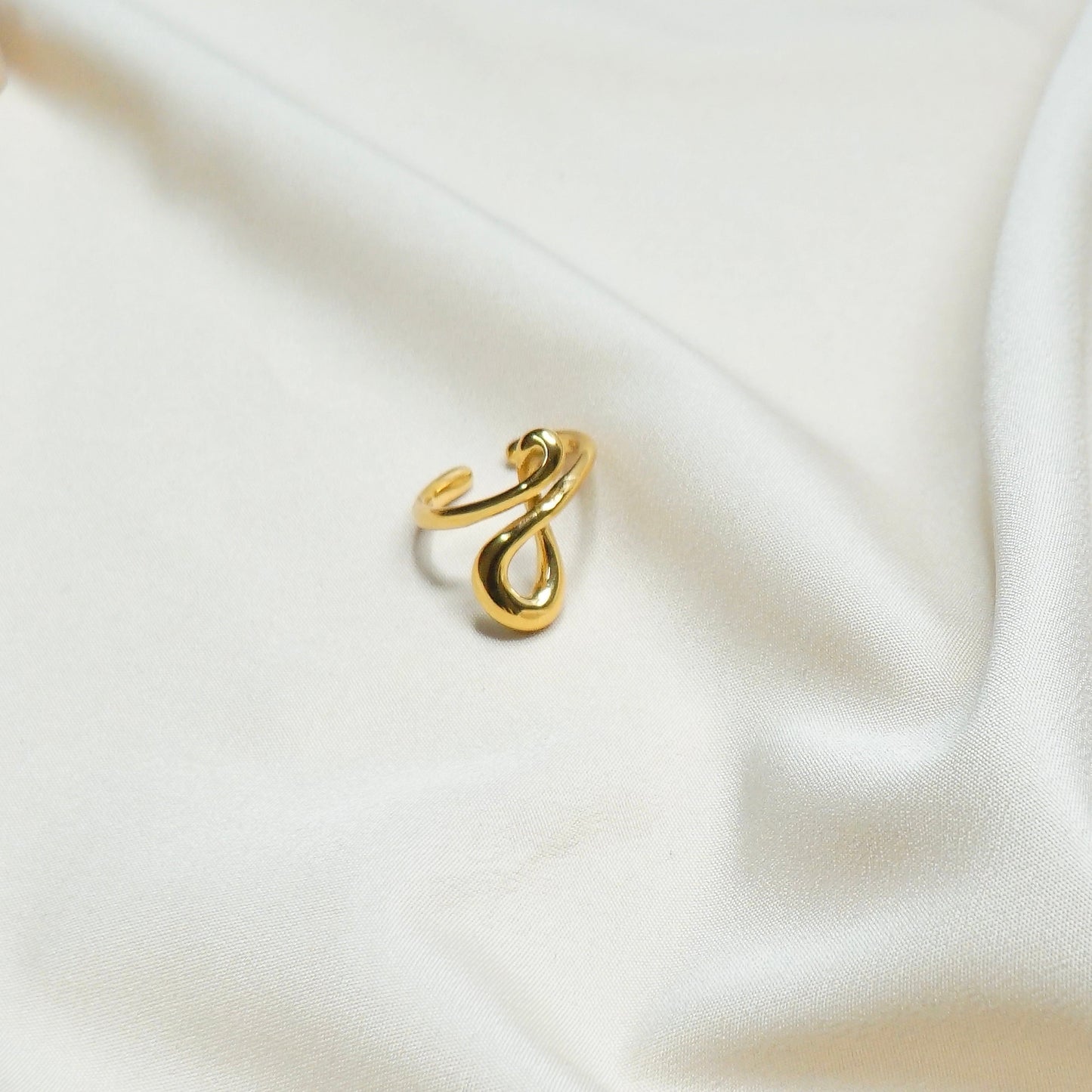 Loop Drop Twist Ring