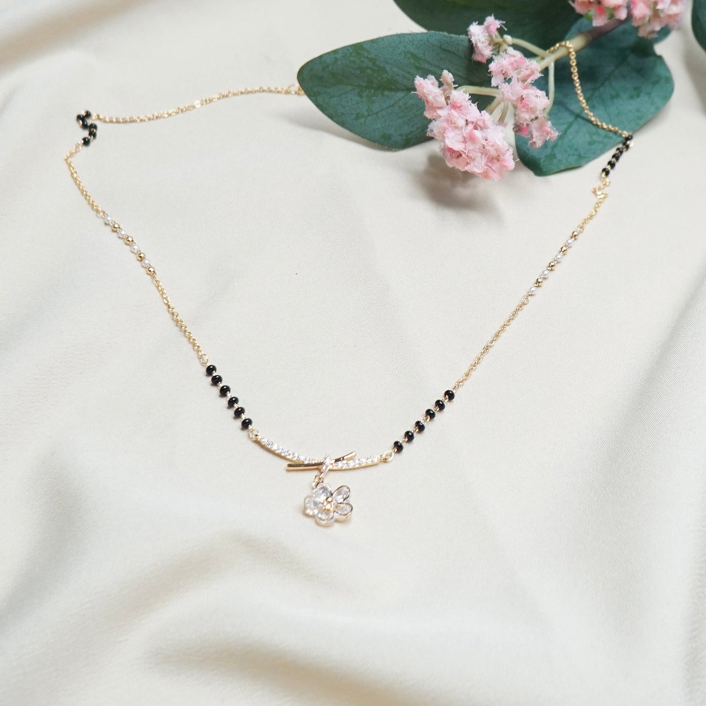 Mangalsutra with pearls and floral Charm